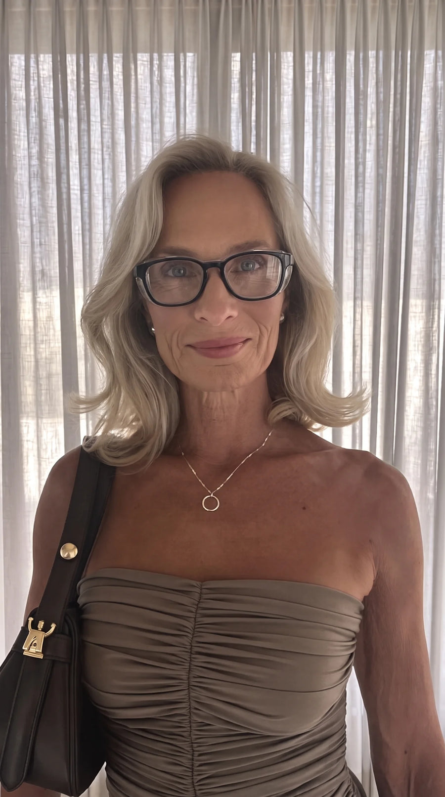 Maya V. wearing Adapt Dew glasses