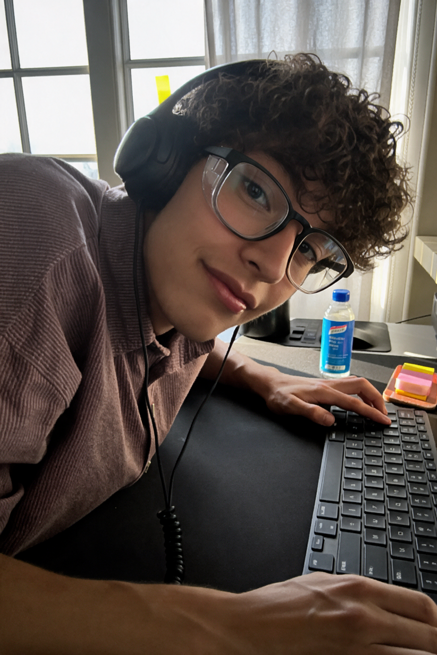 Ethan B. wearing Adapt Dew glasses