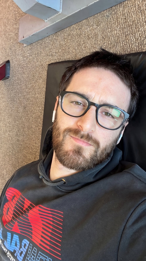 Adapt Dew customer wearing black moisture chamber glasses, real customer photo